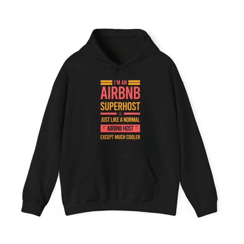 The "I'm an Airbnb Superhost Unisex Heavy Blend Hooded Sweatshirt" is a black hoodie featuring the text: "I'm an Airbnb Superhost. Just like a normal Airbnb host except much cooler," in yellow and red.