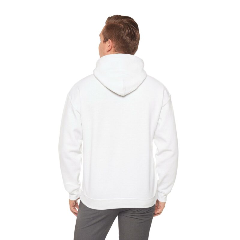 A person standing and facing away, wearing the "I'm an Airbnb Superhost Unisex Heavy Blend Hooded Sweatshirt" paired with gray pants.