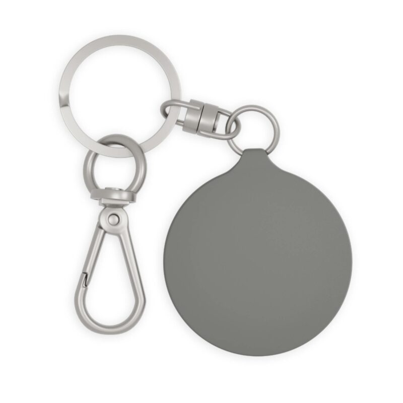 The "I'm an Airbnb Superhost Keyring Tag" is a silver keychain featuring a round gray fob attached to a keyring and secured with a metal clip—an ideal accessory for seasoned hosts or those new to starting on Airbnb.