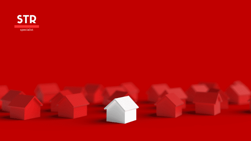 Airbnb Hosting A white house in the middle of a group of houses on a red background.