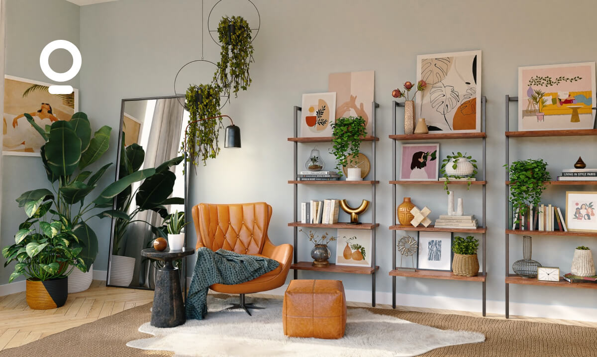 A cozy living room featuring a tan leather chair, a small table, shelves with books and decor, leafy plants, a floor mirror, and wall art, all under soft lighting.